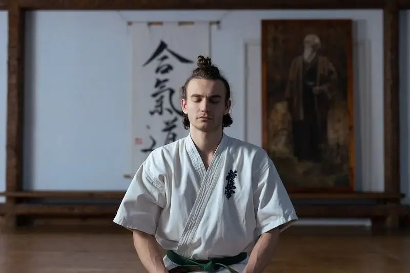 Focused martial artist with eyes closed