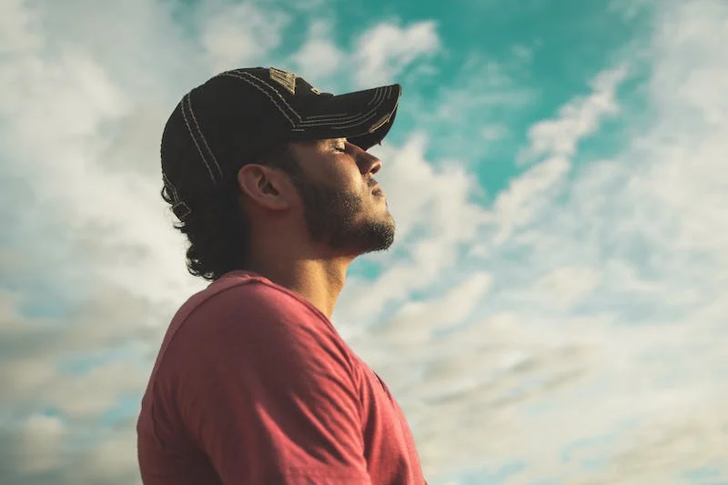 Man breathing outside