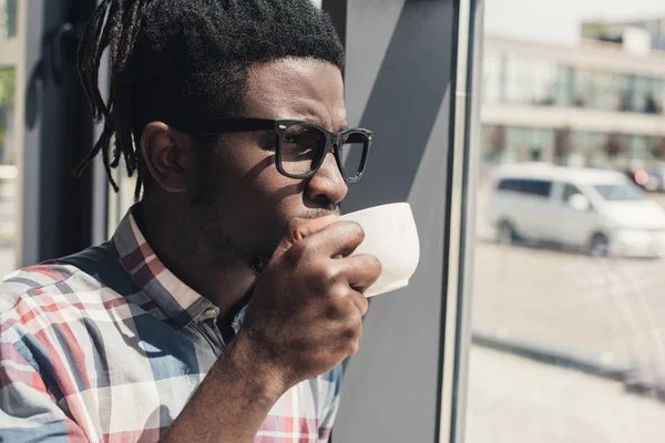 Man drinking coffee