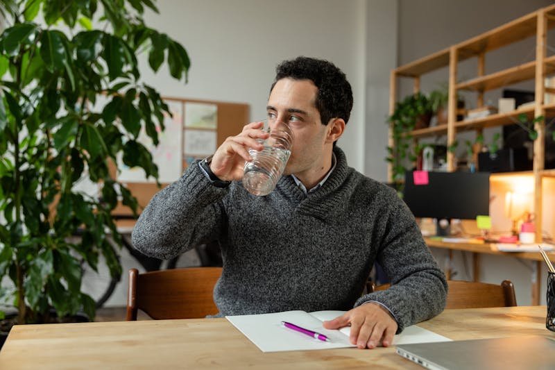 Man replacing coffee break by a water break