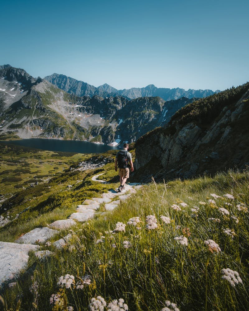 Man mountain hiking in beautiful landscape